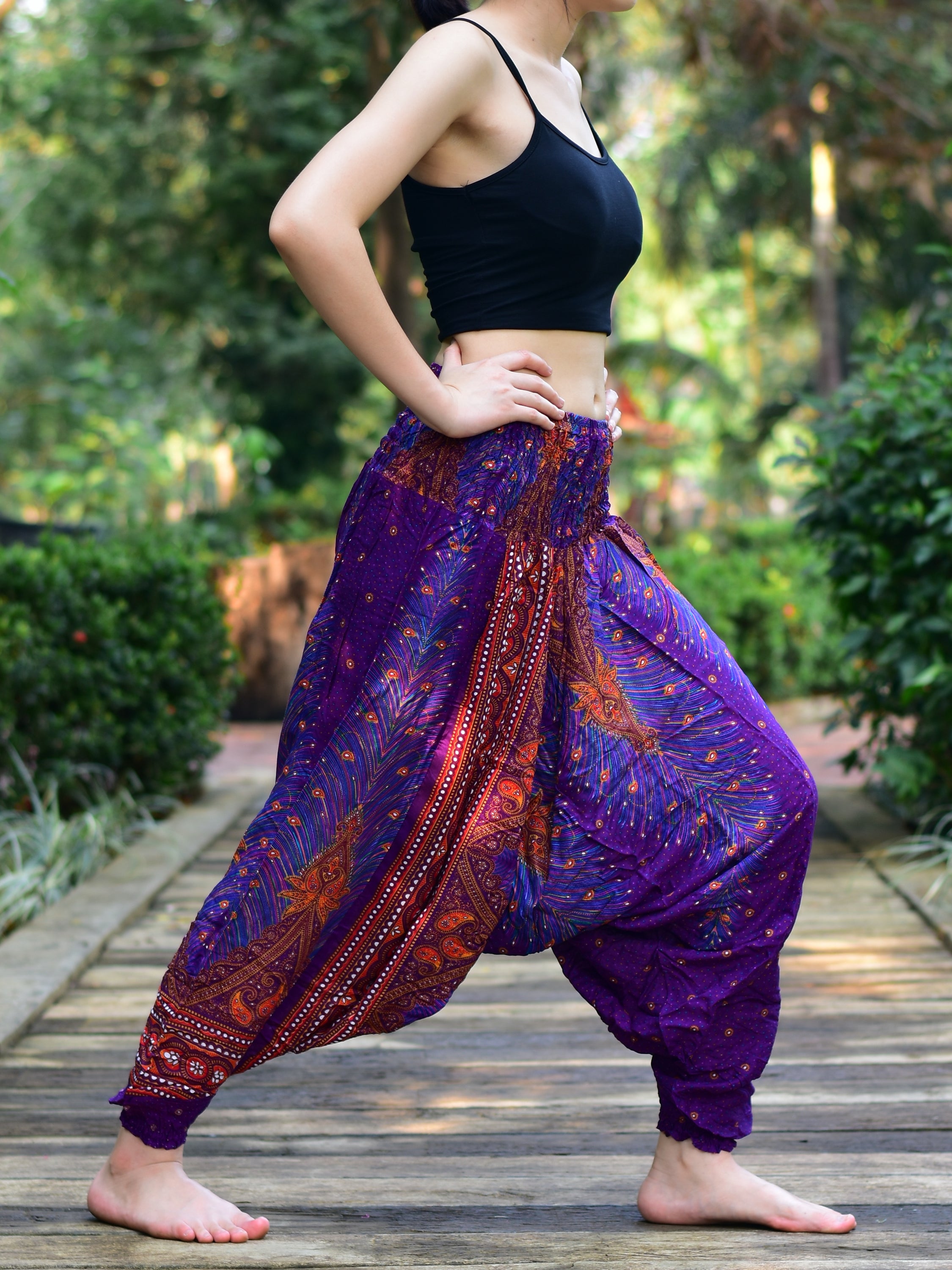 Bohotusk Purple Peacock Moonshine Low Crotch Harem Pants for women, showcasing vibrant colors and unique design, perfect for yoga and lounging.